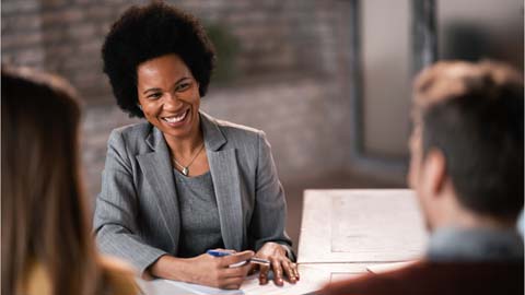 Smiling woman working with finance