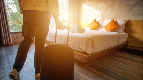 Suitcase and hotel room