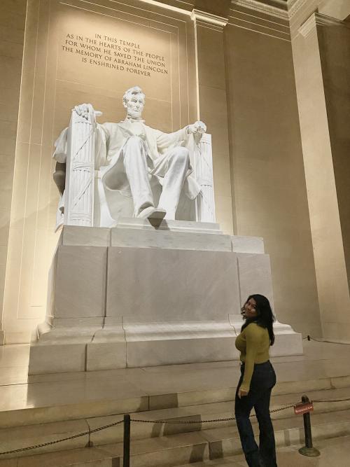 Photo of Diana Alfaro posing in front of the Lincoln memorial